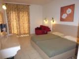 Standard Triple room with garden view