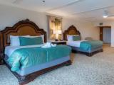 Quadruple Junior Suite with partial ocean view