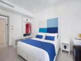 Standard Quadruple room with garden view
