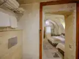 Standard Triple room with courtyard view