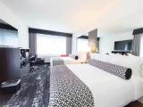 Deluxe Quadruple room with pool view