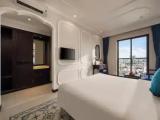 Standard Triple Family room with balcony and with city view