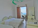 Standard Triple room with balcony and with sea view