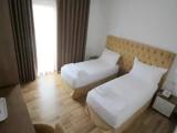 Deluxe Quadruple room with balcony