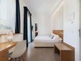 Deluxe Quadruple room with balcony