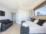 Deluxe Triple room with balcony and seafront