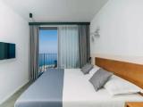 Comfort room with balcony and with sea view