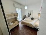 Standard Quadruple room with partial sea view