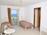Standard Quadruple Family room with garden view