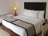 Standard Triple room with garden view