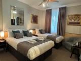 Standard Triple room with garden view