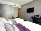 1 Bedroom Deluxe Quadruple room with city view