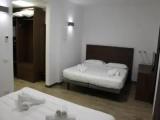 Standard Quadruple room with garden view