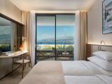 Superior Quadruple room with balcony and with partial sea view