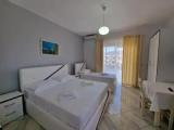 Standard Triple room with balcony and with garden view