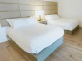Standard Quadruple room with balcony and with partial ocean view
