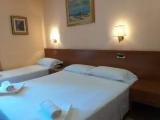 Standard Quadruple room with street view