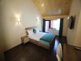 Deluxe Quadruple room with balcony