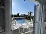 Superior Triple room with balcony and with pool view