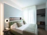 Standard Triple room with partial sea view