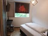 Single room with backyard view
