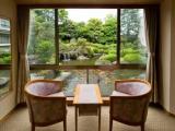 Standard Quadruple room with garden view
