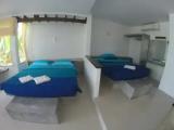 Deluxe Family room with balcony and beachfront