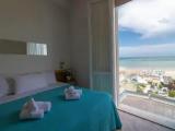 Standard Triple room with balcony and with sea view
