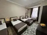 Comfort Quadruple room with courtyard view