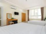 Deluxe Quadruple room with city view