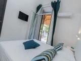 Standard Triple room with balcony and with garden view