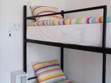 Bed in Dorm with balcony