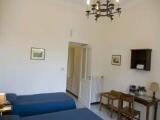 Standard Quadruple room with garden view