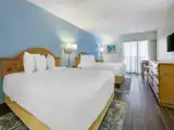 Deluxe Quadruple room with balcony and oceanfront