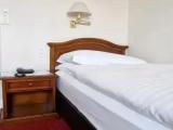 Standard Quadruple room with city view