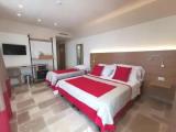 Standard Triple room with garden view
