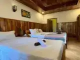 Standard Triple room with balcony and with garden view