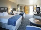 Standard Quadruple room with balcony and with partial ocean view