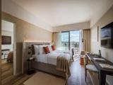 Standard Quadruple room with balcony and with partial sea view