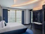 1 Bedroom W Double Suite with partial ocean view