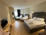 Deluxe Quadruple room with city view