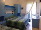 Standard Triple room with balcony and with partial sea view
