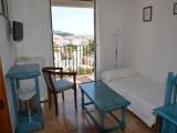 Standard Triple room with balcony and with partial sea view