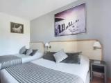 Standard Triple room with balcony and with garden view