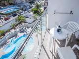 Standard Triple room with balcony and with pool view
