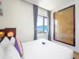 Double room with side sea view