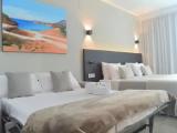 Deluxe Triple room with balcony and with pool view