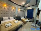 Standard Triple room with sea view