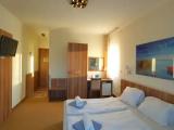 Standard Triple room with street view