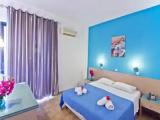 Standard Triple room with garden view